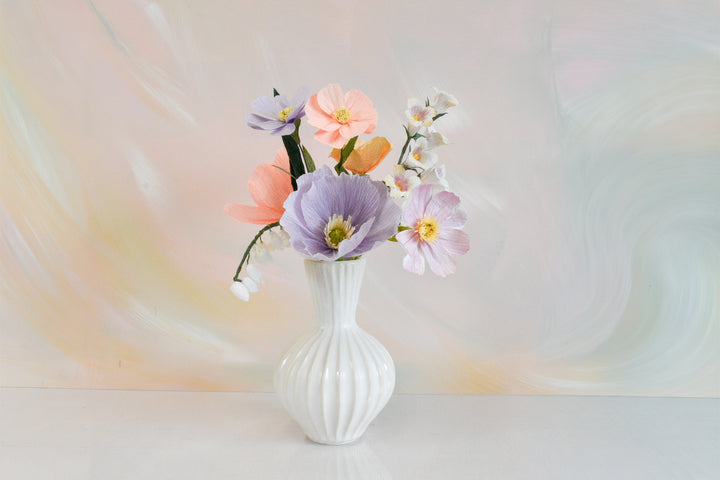 Limited Release Icelandic Poppy, Cosmos, and Lily of the Valley Bouquet