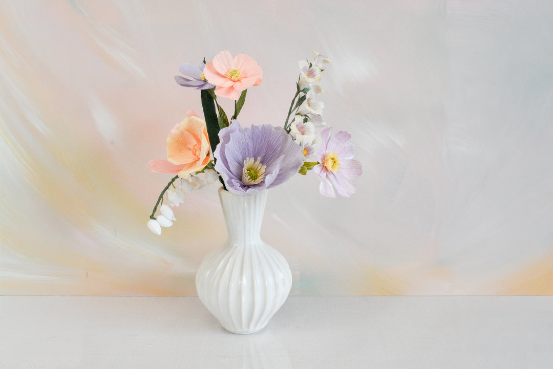 Limited Release Icelandic Poppy, Cosmos, and Lily of the Valley Bouquet