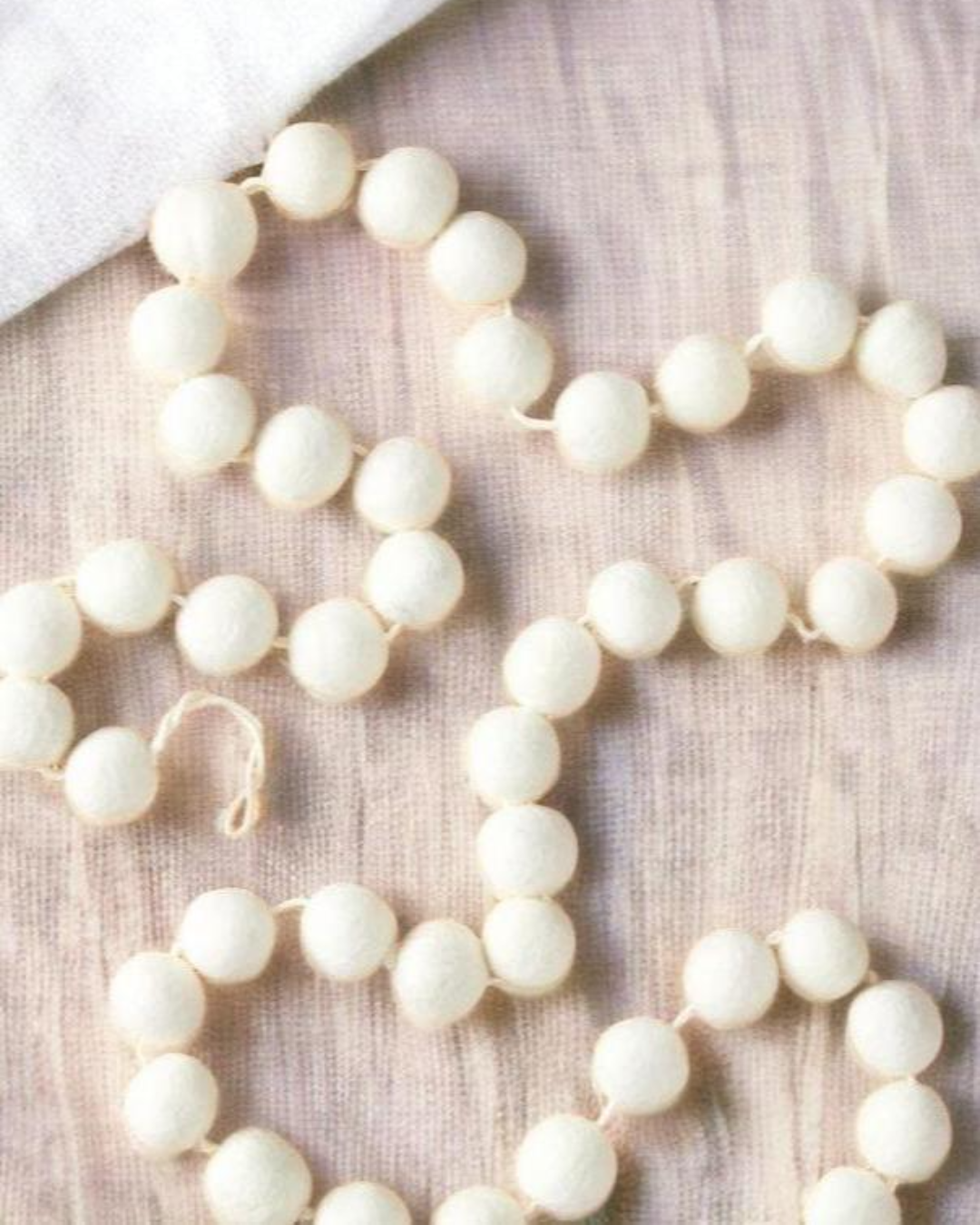 a close up of a bunch of beads on a table