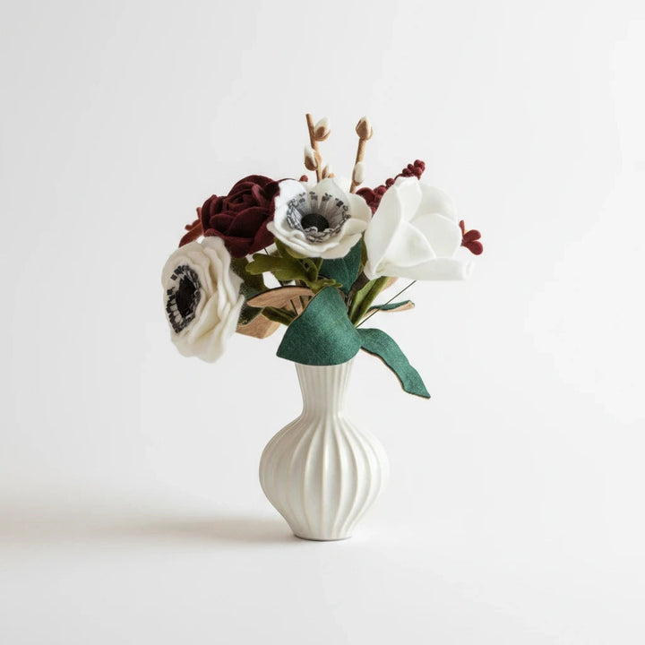 Melly Meier Botanicals handcrafted felt flower bouquet in deep burgundy and white with anemones and magnolias.