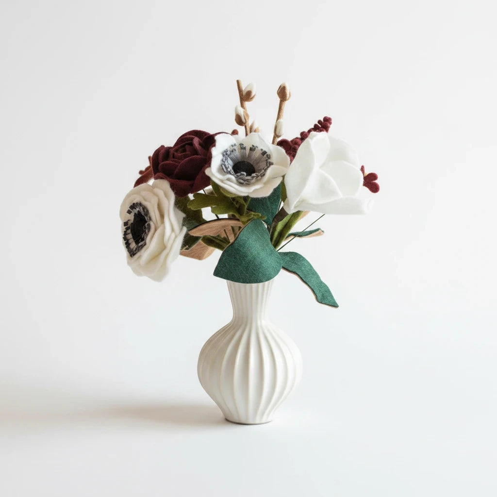 Melly Meier Botanicals handcrafted felt flower bouquet in deep burgundy and white with magnolias and anemones.