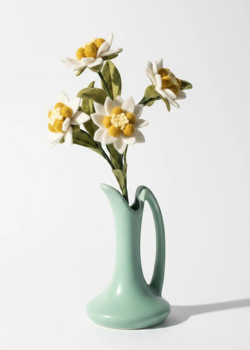 Melly Meier Botanicals white and yellow felt edelweiss stem with green leaves, 12" height.